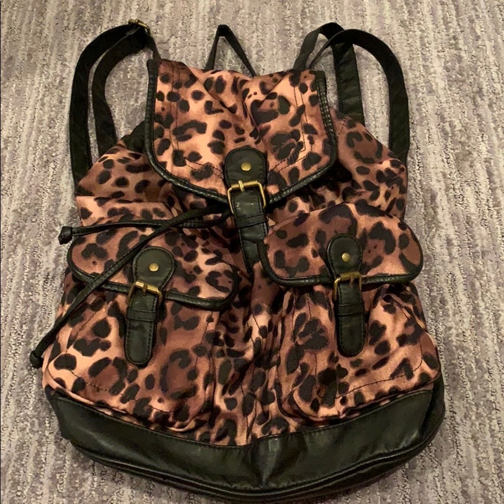 Leopard and leather backpack